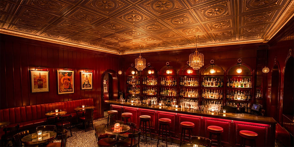 PL01 Aged Copper faux tin ceiling tiles installed in a red cocktail bar