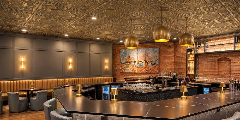 An Ornate PL02 Antique Gold Ceiling Completes a Brick-and-Brass Cocktail Bar